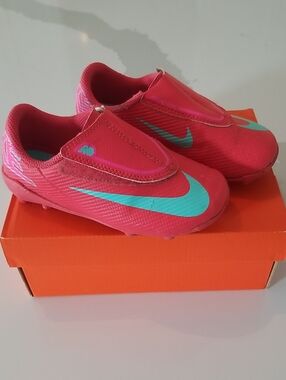 Nike Kids Pink Soccer Cleats with Teal Swoosh